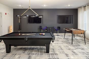 The S Lounge with Billiards, Foosball and Vintage Arcade Games at Abberly Solaire Apartment Homes, Garner, NC, 27529